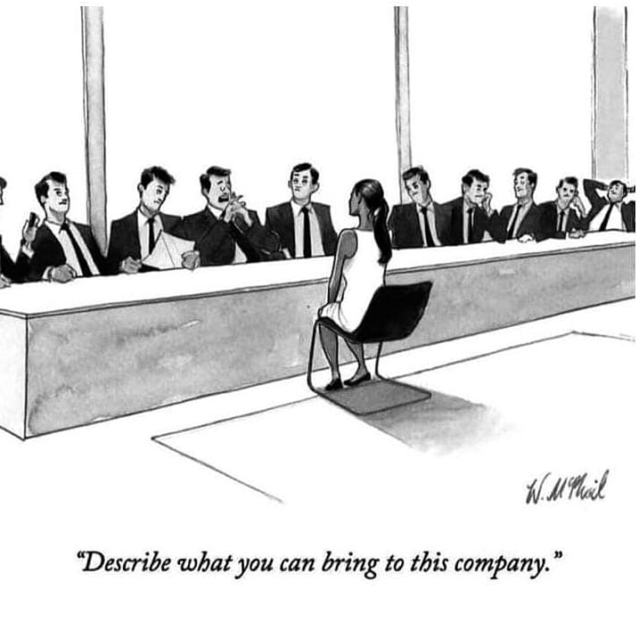 Picture of young minority lady being interviewed in a run full of men . There is no diversity in the room besides the young lady. Showing the life of many black women in construction